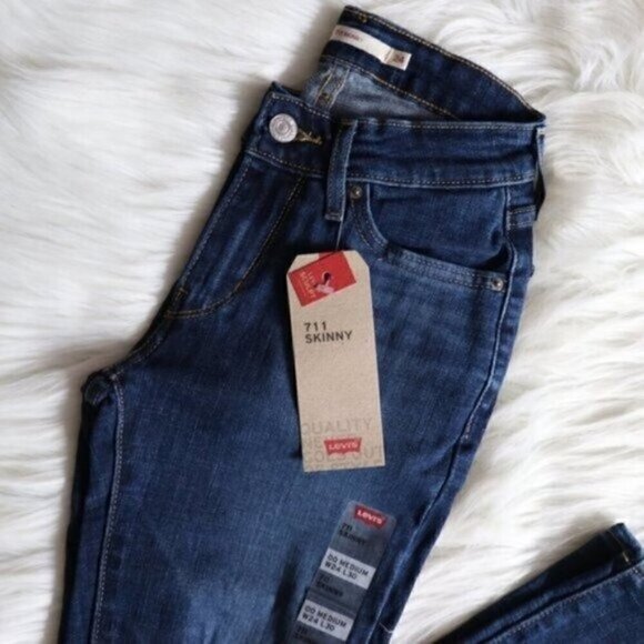 NEW Levis 711 Mid Rise Skinny Jeans Size 24 Dark Blue Wash Distressed - Picture 3 of 6